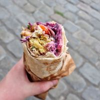 "Gudrunsvej" Falafel roll with grilled aubergine, chili-potatoes and vegan dressing. at Faour in Aarhus