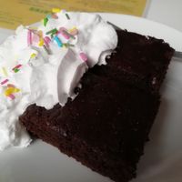 Brownie bite with whipped cream at Guac 'n' Roll in Liverpool