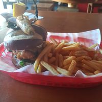 Smoky tofish burger and fries at Guac 'n' Roll in Liverpool