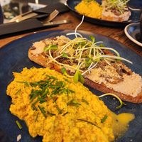 Tofu scramble with toast topped with mushrooms and cashew cottage cheese at Relax na Wilczej in Warsaw