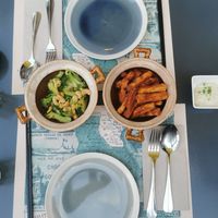 broccoli with chili, salt & cashews / sweet potato fries with vegan dip at Co Chin Chin in Zurich