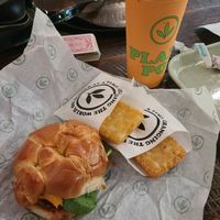 Bacon Egg and Cheese Croissant Meal with 2 Hashbrowns and 20oz Caramel Cold Brew at Plant Power Fast Food in Redlands