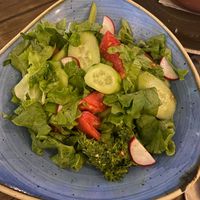 green salade with tomatos instead of olives at SunMoon - Solunska in Sofia