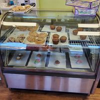 Bakery display with biscuits at the top. They had bacon and sausage that day at Apron Strings in Ocean Springs