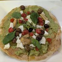 Avocado Pinza with tofu, olives, and porcini at Avocado Bar in Rome