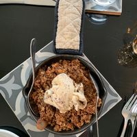 Apple crisp for dessert is served hot in a cast iron skillet. Wonderful ! at Sage and Cinder in Mukilteo