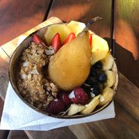Chia Pudding Granola with poached pear at Vybe Cafe in Emerald