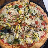 Huge Roasted Veggie with Fork and Sunglasses for size comparison (ordered a Large!)  at Gina's Pizza in Laguna Beach