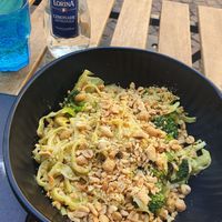 Rice noodles with tofu, caju, brocoli, and curry coco sauce. Peanut topping. at MOK in Rouen