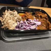 Coleslaw (purple middle ) “Chicken”  shawarma (left) char sui pork(middle)  Bali unbeef(right) at Mathilda's in Oshawa