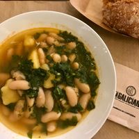 Caldo de grelos con fabas y cachelos at The Veggie Carmen in Santiago De Compostela