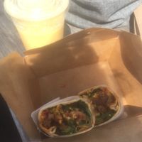 Breakfast burrito and tropical smoothie, they subbed the honey with dates!  at Lulu's Empowering Goods in Lindenhurst