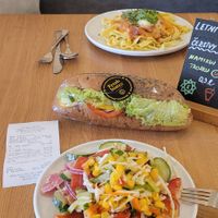 300gr of mixed salads and a smoked tofu baguette. Vegetarian pasta wt sundried tomato sauce on the back at Slunecnice in Plzen