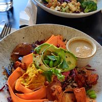 Buddha bowl in the front, tofu bowl in the background at Green Hippo in Helsinki