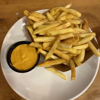 Patatas con salsa brava  at Mano a Mano in Cartagena