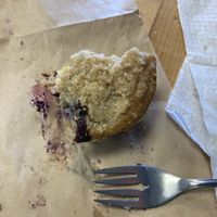 What’s left of my blueberry muffin by time remember take photo it was so good   at Culture Coffee & Tea Bar in Virginia Beach
