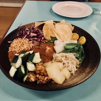 Gado Gado Salad: 
Long beans, purple cabbage, sugar snap peas, bean sprouts, boiled potatoes, cucumber, tempeh, steamed rice cake, potato chips and spicy peanut sauce. at Privé - Asian Civilisation Museum  in Central Singapore