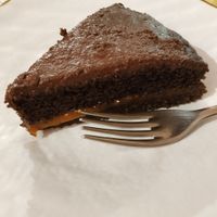 Vegan "Sacher". Some kind of chocolate cake with apricot. at Cantina & Bottega in Gravedona Ed Uniti
