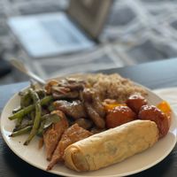 Everything on one plate.  We enjoyed immensely!! at Buddha's Vegan Restaurant in Toronto