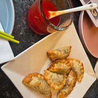 Dumplings & pineapple sauce at Buddha's Vegan Restaurant in Toronto