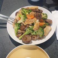 Mushroom tofy mixed veg rice noodles at Buddha's Vegan Restaurant in Toronto