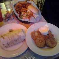 Vegan Hashpipe Burrito: veggie burger, tofu, veggies, cheddar, bbq. vegan fried pickles. non-vegan: Gut Bomb: hamburger, cheddar, veggies & hot sauce at Silly's Restaurant in Portland
