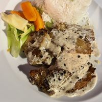 Seitan with pepper sauce. Tasty vegetables.  at Safari in Portimao