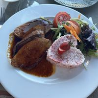 Seitan with agave, and strawberry rice  at Safari in Portimao