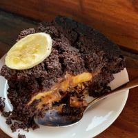 Vegan chocolate cake filled with almonds and cream and banana  at Hangten Rooftop Restaurant in Weligama