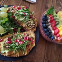 hummus avocado bread and smoothie bowl  at Panenská Kaviareň in Bratislava