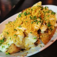 Cheesy potato wedges at Pura Vita in West Hollywood