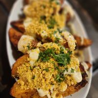 Potato wedges with garlic cashew cream at Pura Vita in West Hollywood