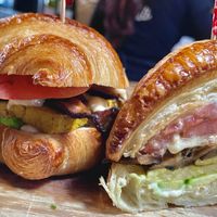 QUEEN CORNETTO
Tofu egg, shiitake bacon, cashew mozzarella, avocado, heirloom tomato, roasted garlic cashew aioli, toasted croissant  at Pura Vita in West Hollywood