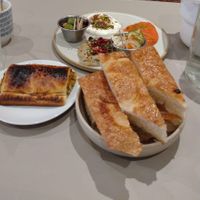 Vegan sausage rolls and 3 dips with bread. Cheaper to buy individually which is odd. at Medina in Aberystwyth