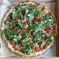 build your own pizza with regular dough, red sauce, vegan cheese, vegan spicy chorizo, mushrooms, spinach, roasted red bell pepper, and arugula  at Blaze Pizza - PCH in Torrance