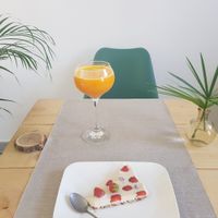 Fresh carrot, ginger, tumeric and orange Juice and cheesecake at Happy Green Food in Saint-raphael