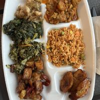 Cabbage, red red stew, jollof rice, fried plantains, chef’s special tofu, mixed greens, spinach (all vegan from buffet)  at Africanne on Main in Richmond