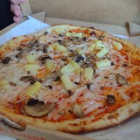 Pineapple and Mushroom Pizza with Vegan Cheese at Blaze Pizza in Atlanta