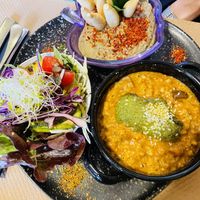Salad, hummus, and barley risotto  at Lo de Ponxe En El Kinto Pino in Valencia