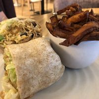 9-Layer Burrito with Sweet Potato Fries. We’ve had great SPF’s here, but this batch didn’t make the grade. Burrito was just so-so.  at Fresh on Spadina in Toronto