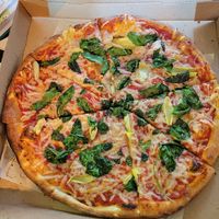Vegan cheese pizza with spinach and artichoke at Blaze Pizza in Clark