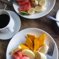 Breakfast with local fruit and vegan banana pancakes at Soka Warung in Penida Island