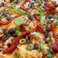 Regular crust, red sauce, bell peppers, red peppers, garlic, and olives   at Blaze Pizza in College Station