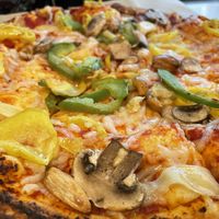 Thick crust, vegan cheese, bell and banana peppers, mushrooms   at Blaze Pizza in College Station