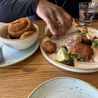Cauliflower tacos and onion rings   at Fresh Kitchen + Juice Bar in Toronto
