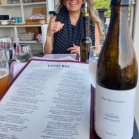 My wife, Lucy, a Maine beer and a view of the full menu. at The Causeway in Spruce Head