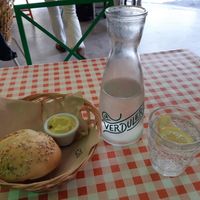 Bread, spicy vegan mayo and fizzy water at La Verduleria in Tenerife