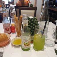 Drinks and bread at Rosmarino in Taormina