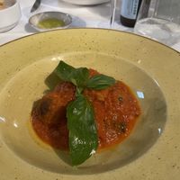 Sicilian balls (chickpea and aubergine) in tomato sauce.  at Rosmarino in Taormina