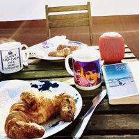 Nothing better than eating warm delicious croissants warmed by the early morning sun 😋  at Pasteleria Conchin in Valencia